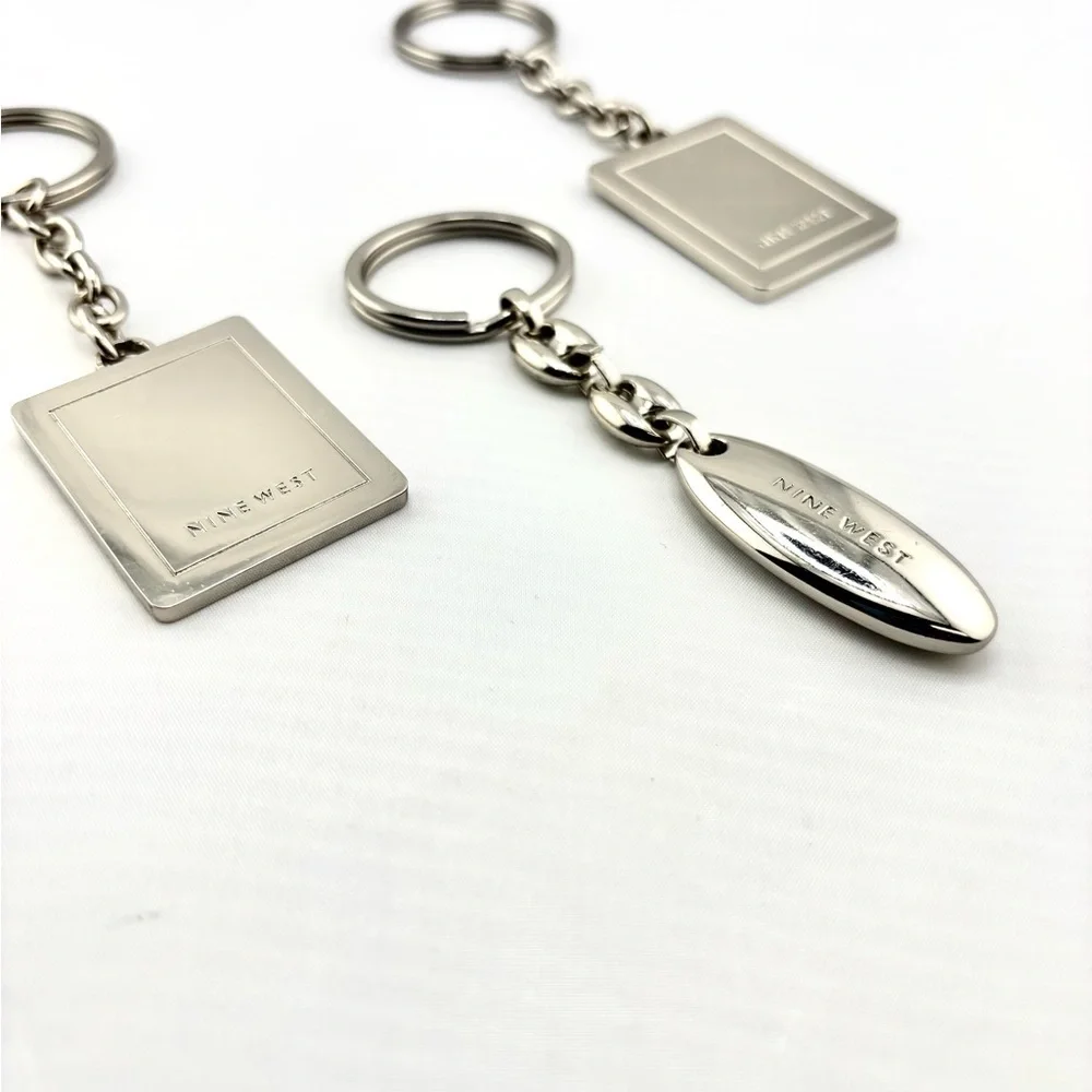 Nine West Silver Tone Logo Keychain Bundle - Lot of 3